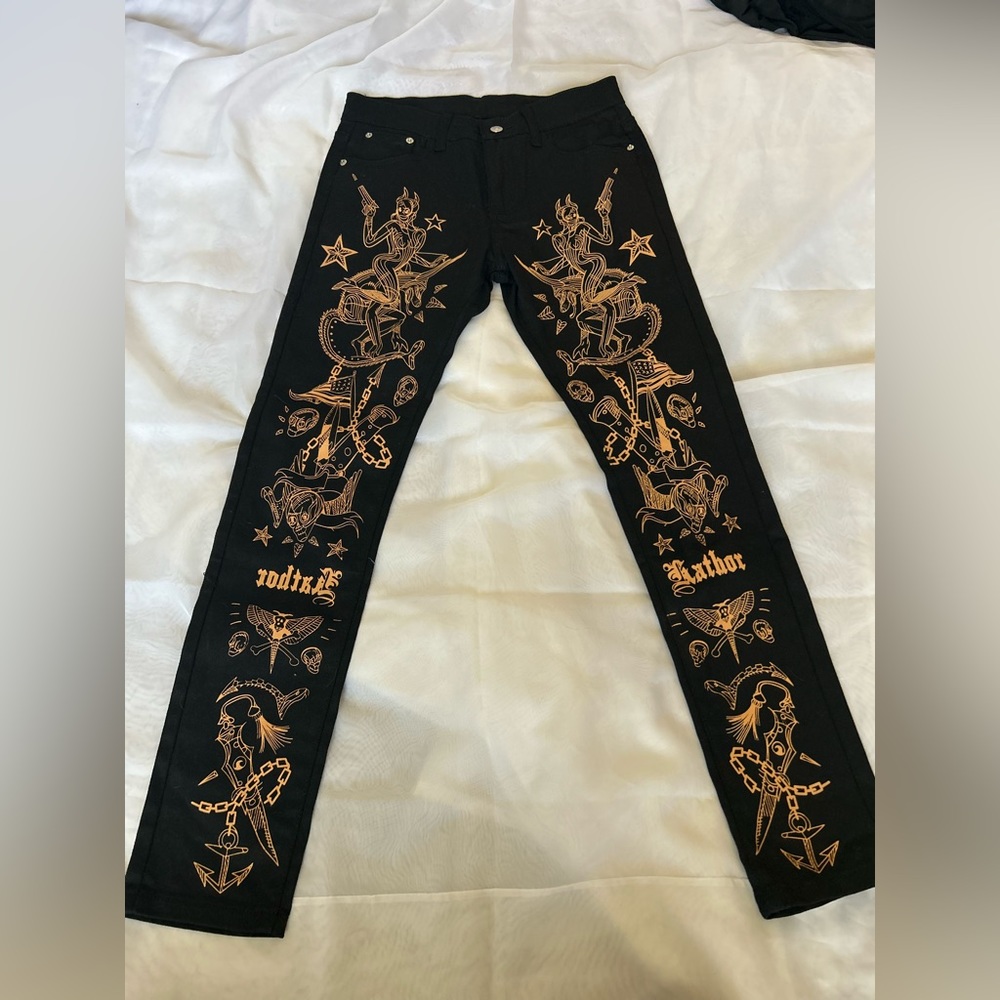 Black and orange decal jeans